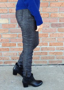 cold weather style: snake print jeans, sweater, and black booties