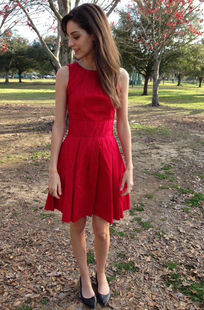 full pleated skirt with waist inset and pleats at neck