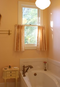 mixing textures of lace and satin fabric for bathroom cafe curtains