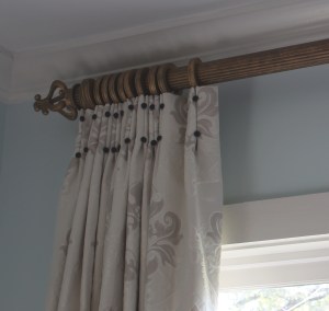 custom drapes with inverted pleats and covered buttons