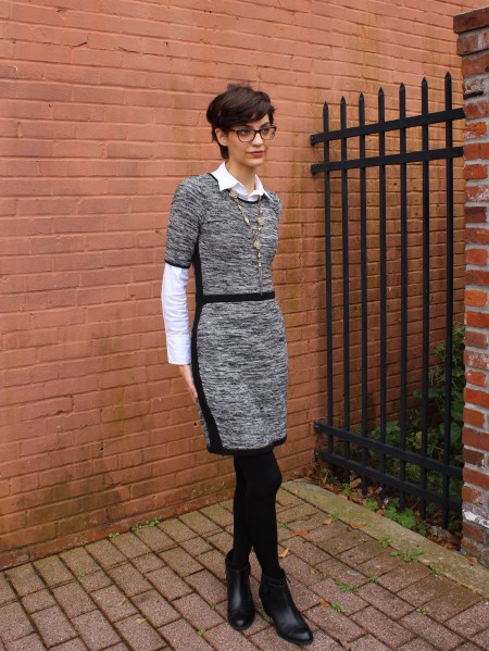 short sleeve sweater dress layered over button up shirt