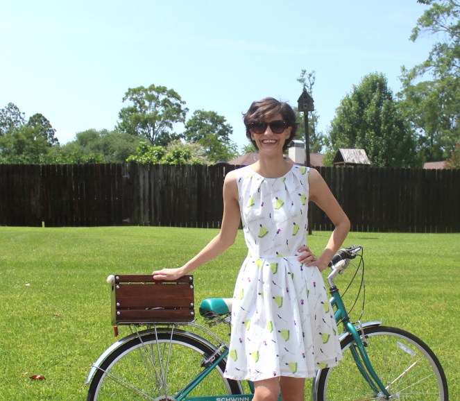 White, cotton print dress for spring and summer. With pockets